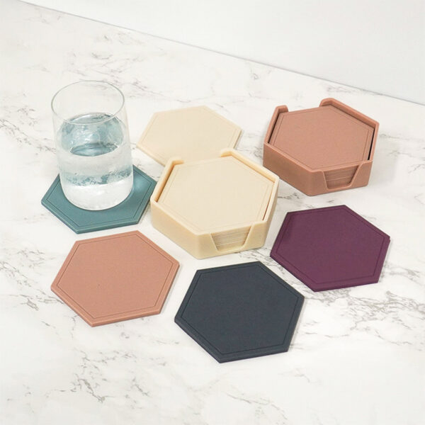 Our Earthly Drink Coasters (6pc Set With Holder) helps to prevent heat and water stains on your tables! Choose from 5 earthly colours depending on your dining room style. Its silicone material allows for fuss-free cleaning, and is perfect for any temperature of beverages.